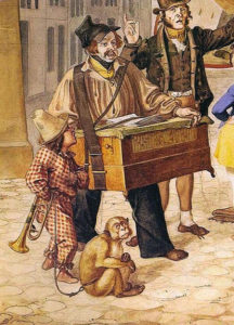 kolorierte Zeichnung: Mann mit tragbarer Drehorgel an Lederriemen um den Hals, links daneben kleiner junge im Clownskostüm und am Boden Äffchen an der Leine