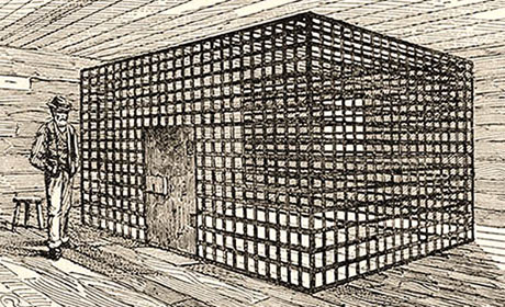s/w Zeichnung: von allen Seiten einsehbare Gitterzelle, um die der Aufseher herum laufen kann