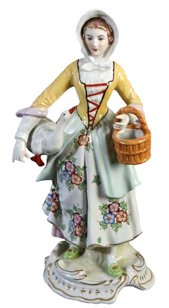 Porzellanfigur: Magd in Tracht mit Blumenrock und weißer Haube, eine Gans untem Arm.