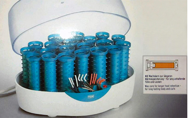 Farbfoto: Wickler im Aufwärmbehälter mit Elektroanschluss