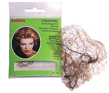 Farbfoto: hauchzartes Haarnetz neben Verpackung