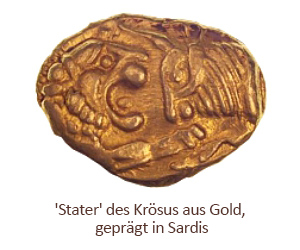 Farbfoto: Goldmünze zeigt Löwe, der frontal einen Stier angreift